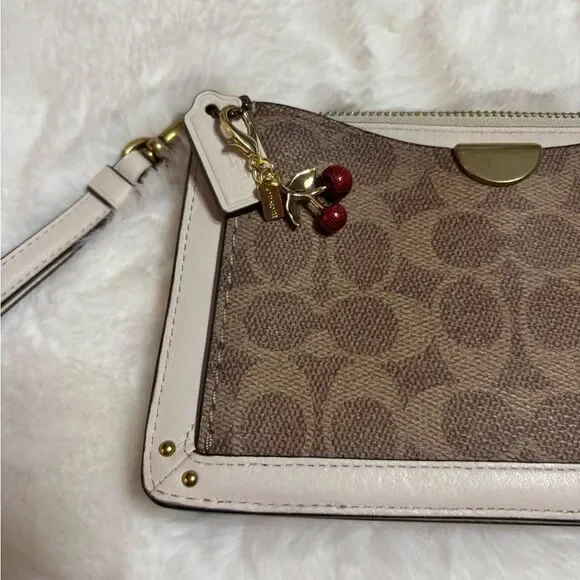 Coach Signature Dreamer Brown and White Women's Wristlet with Cherry Charm - Picture 3 of 9